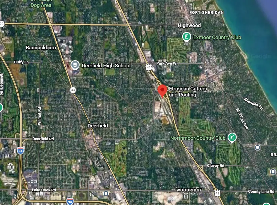 Satellite map view of Deerfield, Illinois, highlighting Etruscan Gutters and Roofing with a red marker near major roads and local landmarks such as Deerfield High School and Northmoor Country Club.